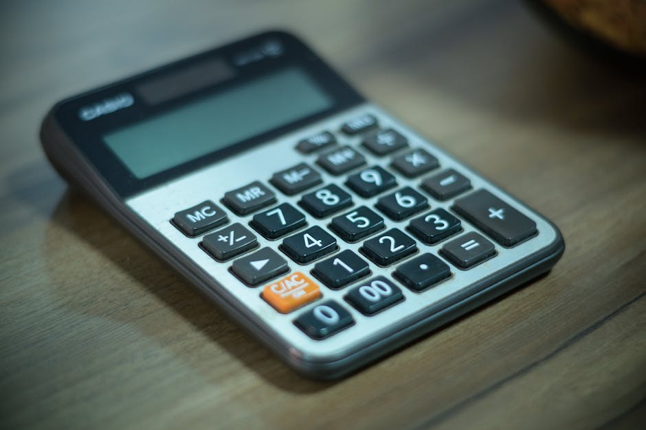 financial numbers calculator desk forex trading ZenithFX